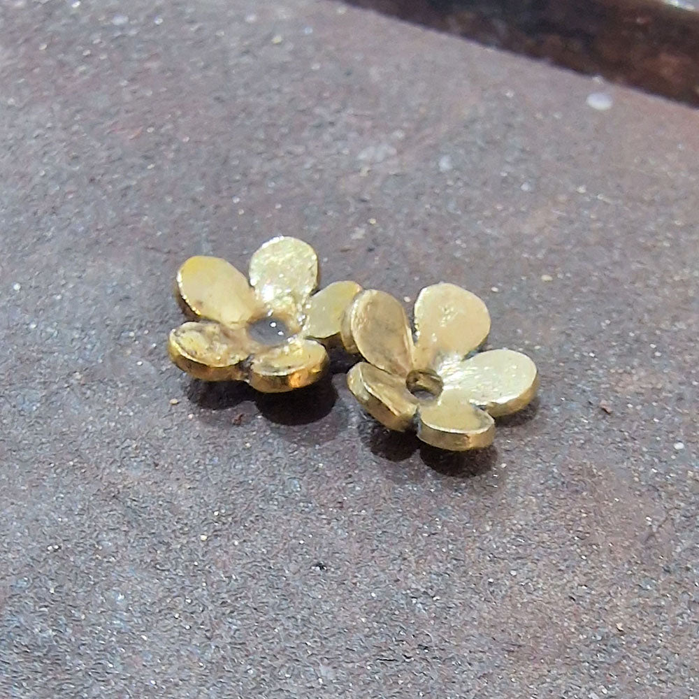 The second stage of hand-making our customers Diamond 18ct Yellow Gold Flower Stud Earrings. Handmade at Golden Snowdrop, the jewellers in Shaftesbury near Fordingbridge. 