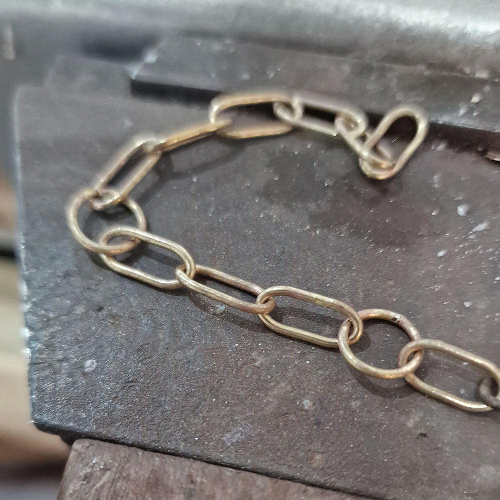 Progress shots of the bespoke, Engraved Emerald 9ct Gold Bracelet. Handmade and laser engraved at Golden Snowdrop the jewellers in Shaftesbury, near Amesbury. 