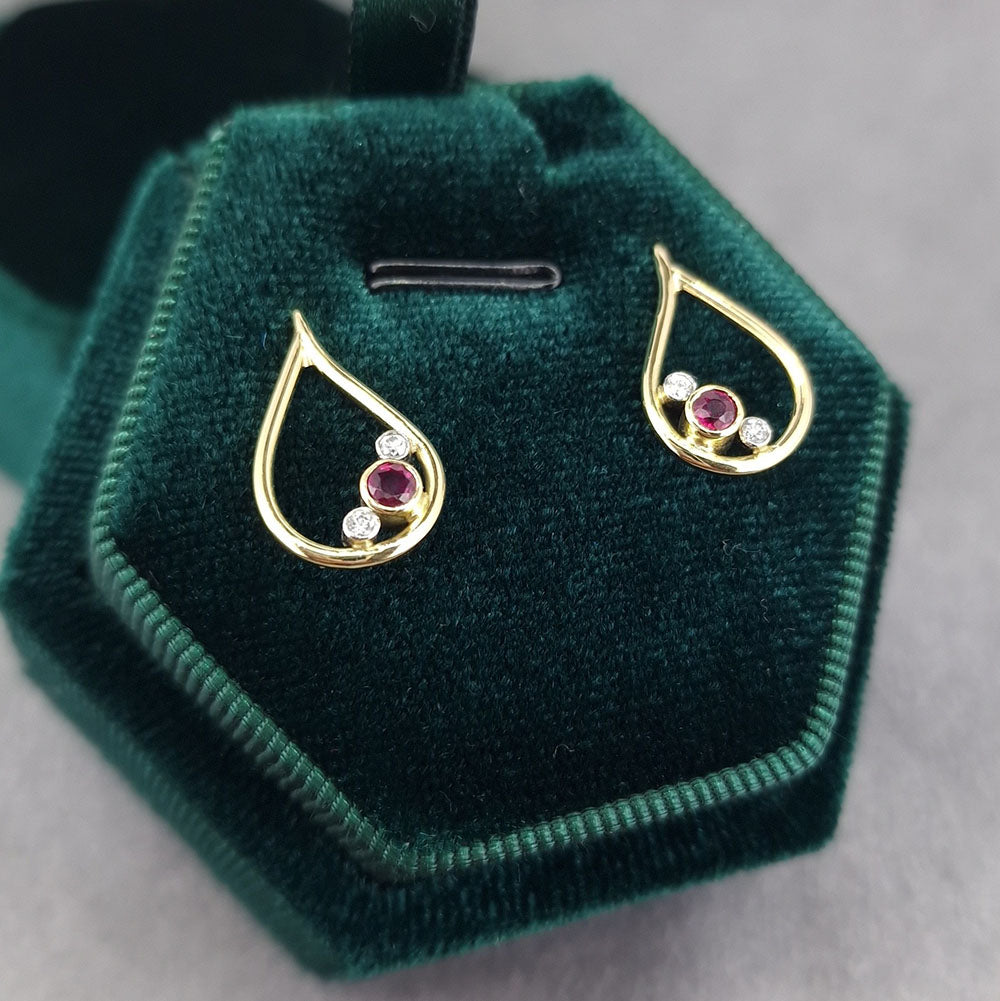 The final peice, Bespoke Ruby and Diamond 18ct Yellow Gold earrings. Handmade from our customers remodelled gold and gemstones at Golden Snowdrop, the jewellers in Shaftesbury near Tisbury.  
