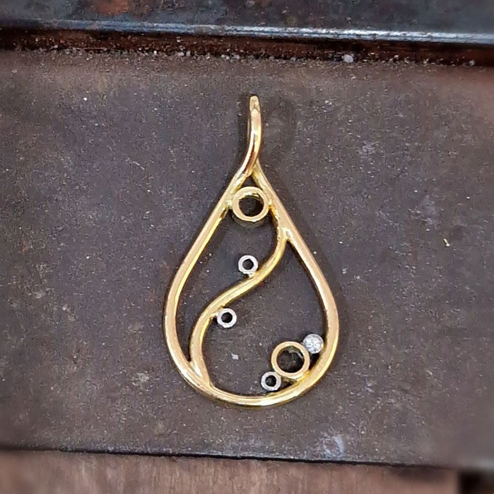 18ct Yellow Gold and Platinum Pendant ready to have the gemstones set. Handmade from our customers remodelled gold and gemstones at Golden Snowdrop the jewellers in Shaftebsury, near Wiltshire. 

