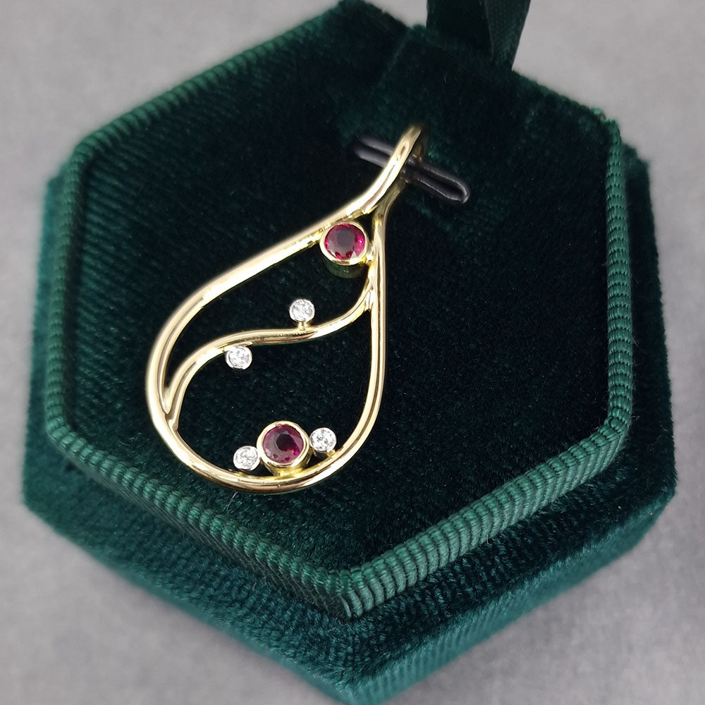 The final piece, a Ruby and Diamond 18ct Yellow Gold and Platinum Pendant. Handmade from our customers remodelled gold and gemstones, at Golden Snowdrop the jewellers in Shaftesbury, near Wimborne. 
