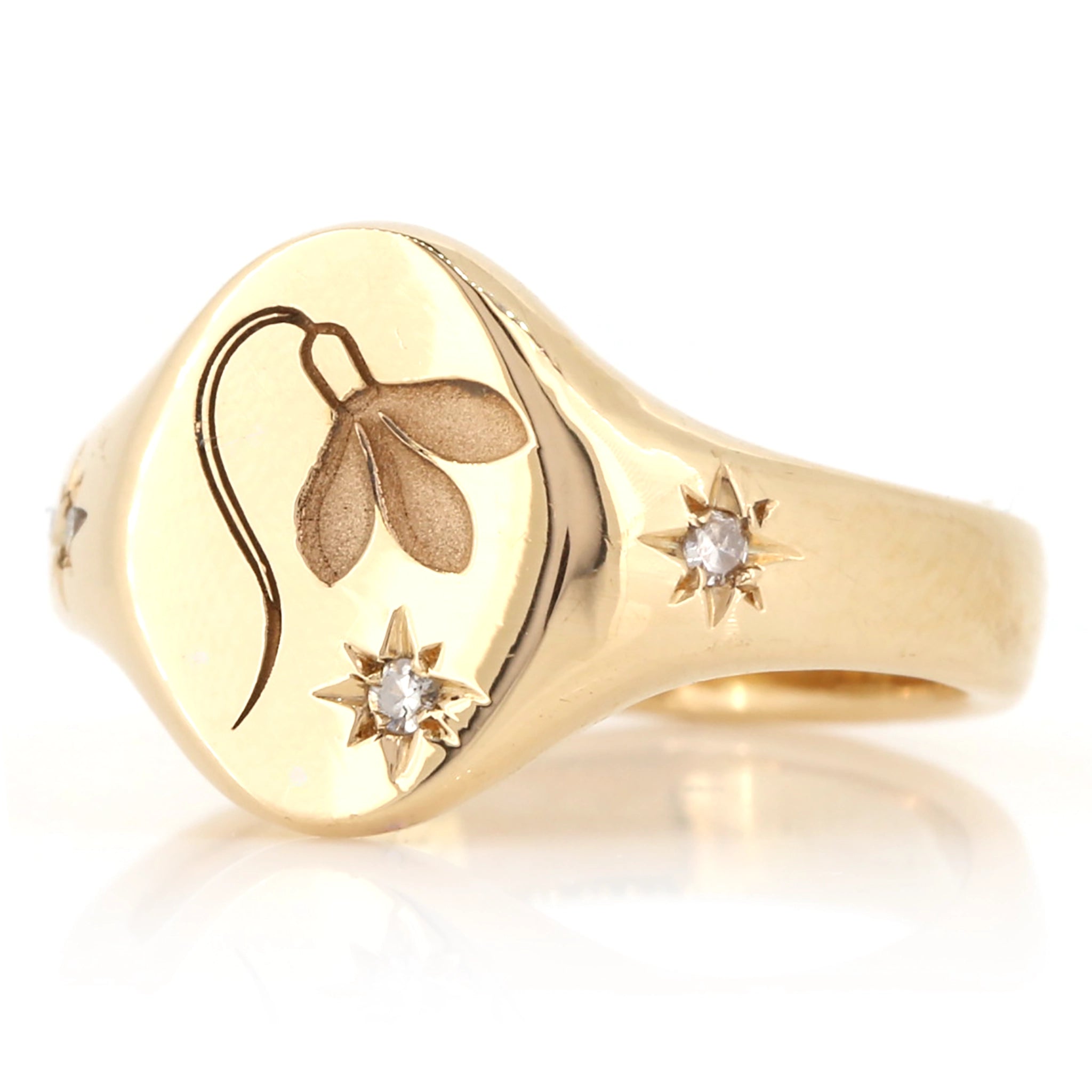 Bespoke 18ct yellow gold signet ring with engraved snowdrop motif and diamond star side detail | Golden Snowdrop