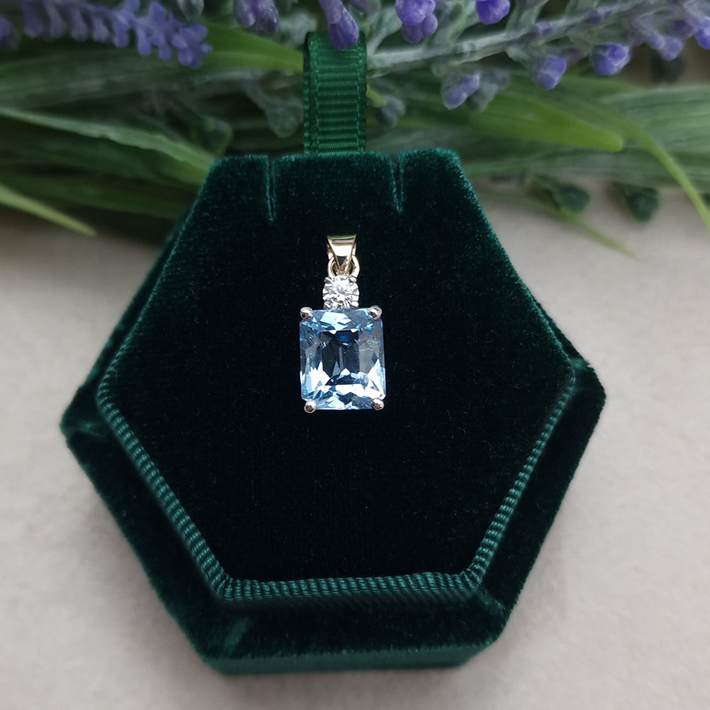 The final bespoke piece of the Aquamarine, Diamond and 9ct Yellow Gold Pendant with a 9ct White Gold Setting. Remodelled using our customers 9ct, Aquarmarine Bar Brooch and White Gold Diamond Solitaire necklace, at Golden Snowdrop the jewellers in Shaftesbury, near Warminster. 