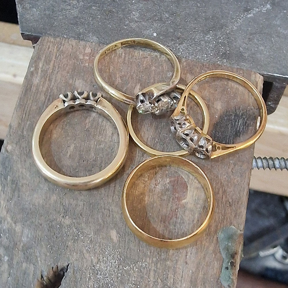 Our customers original Gold and Diamond rings used and remodelled into a gratuated, 5 stone Diamond, yellow Gold ring at Golden Snowdrop Jewellers in Shaftesbury Dorset, near Gillingham. 