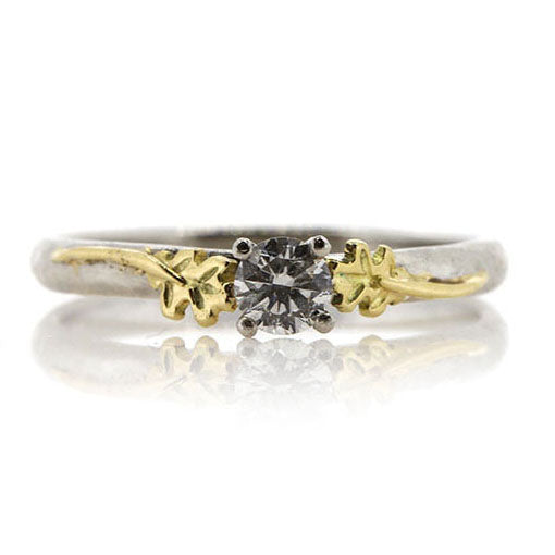 Bespoke Diamond Solitaire Engagement Ring. Handmade in Platinum with 18ct Yellow Gold Oak leaf shoulders at Golden Snowdrop, the jewellers in Shaftesbury near Mere.
