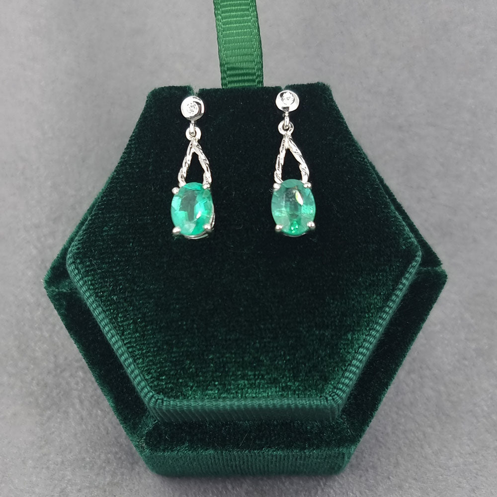 Bespoke Emerald and Diamond Platinum Drop Earrings. Handmade using our customers emeralds and diamonds at Golden Snowdrop the jewellers in Shaftesbury, near Stockbridge. 