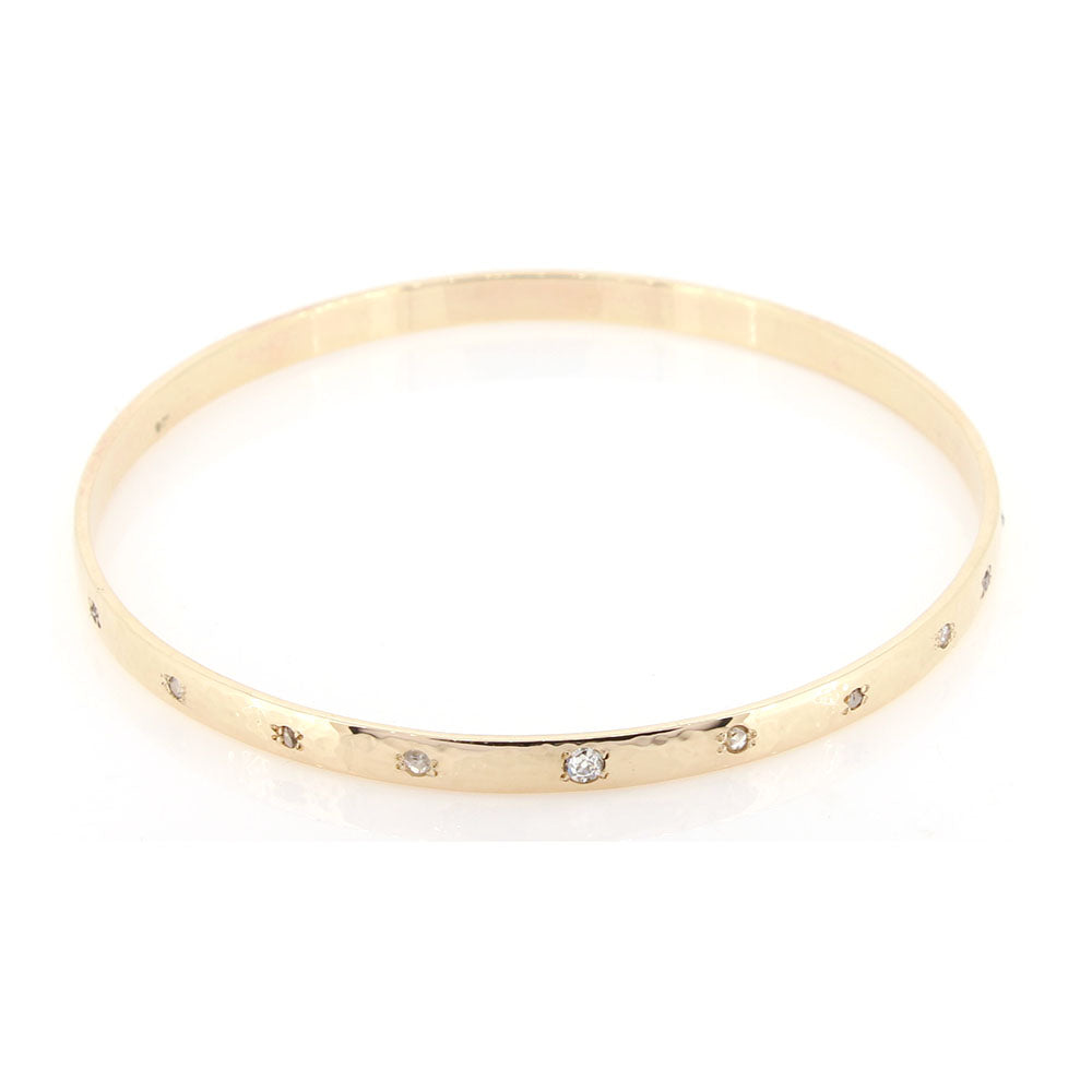 Bespoke Diamond and 9ct Yellow Gold Bangle with a Dappled, Hammered Finish. Made using our customers assorted gold at Golden Snowdrop the jewellers in Shaftesbury, near Frome. 