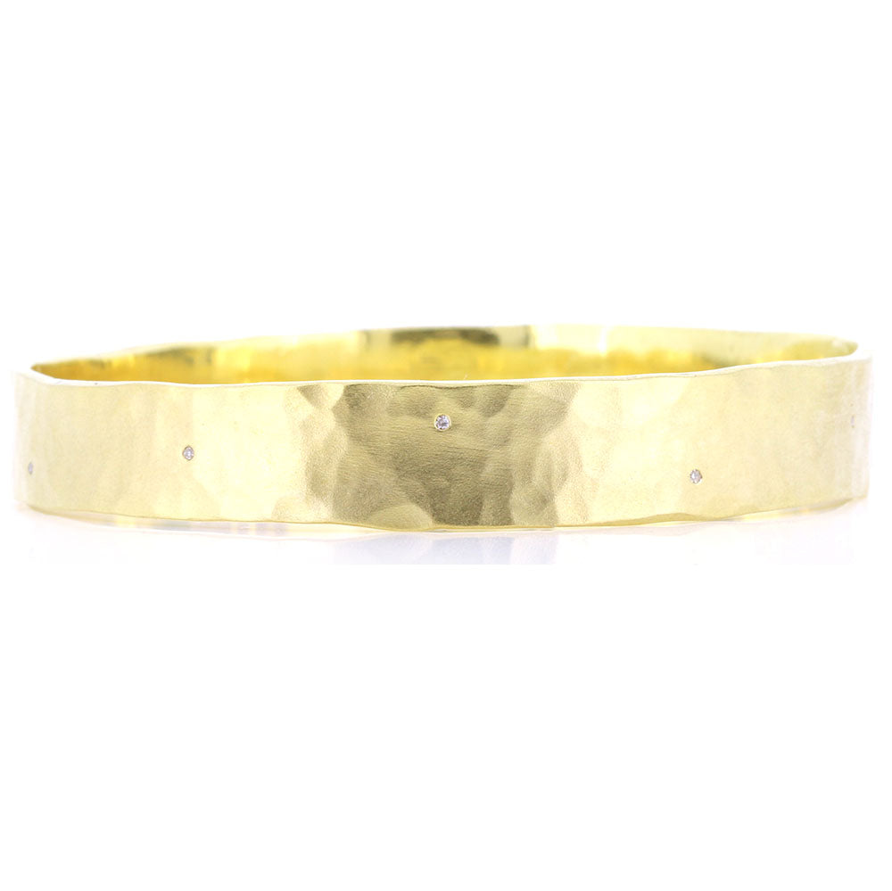 9ct Yellow Gold Bangle, with Twelve Diamonds Flush Set at Equidistance around the Band with a Hammered, Satin Finish. Bespoke design made using our customers remodelled Gold at Golden Snowdrop the jewellers in Shaftesbury, near Stockbridge. 