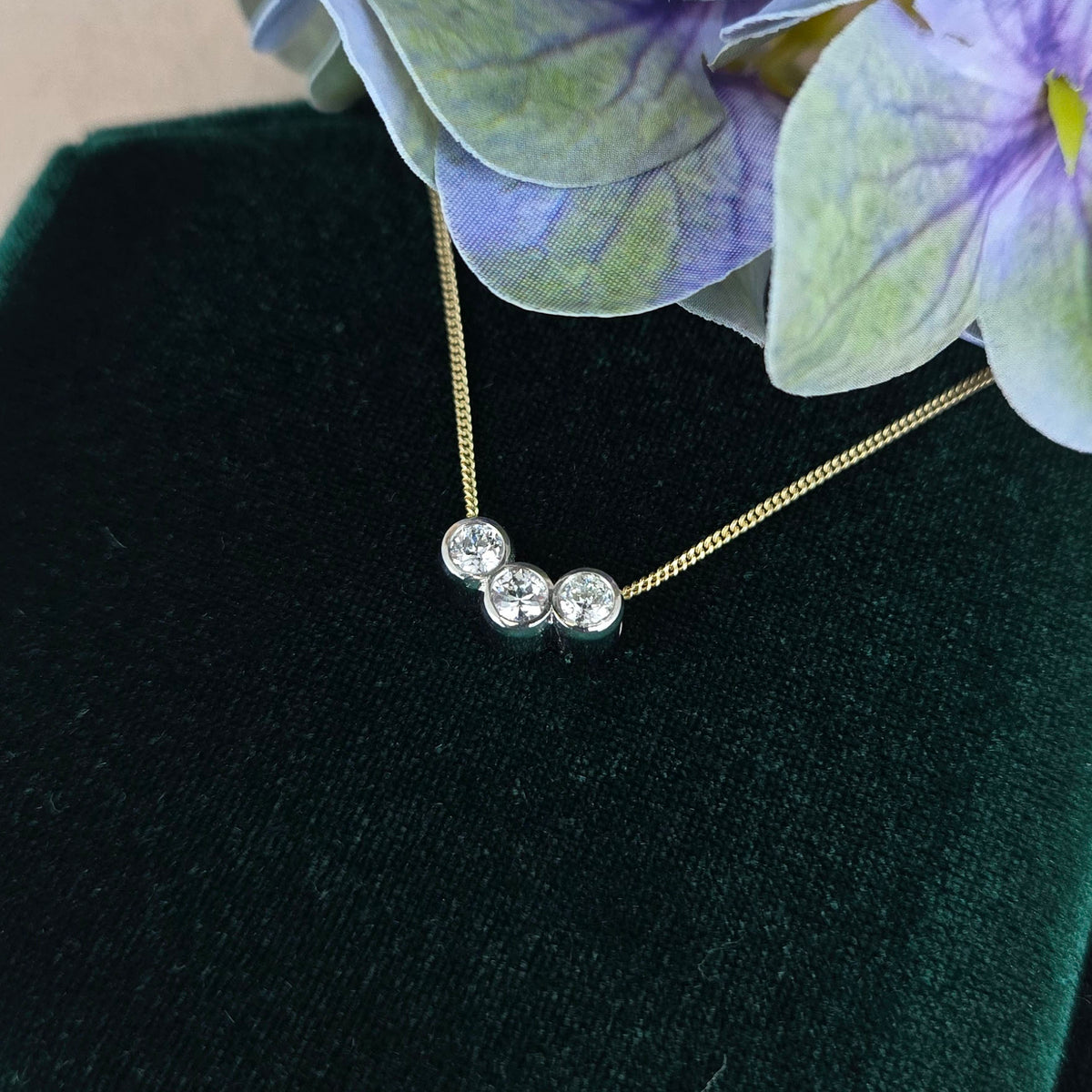Diamond trilogy slider pendant on 9ct yellow gold fine curb chain. Remodelled from brooch. Golden Snowdrop Shaftesbury Dorset