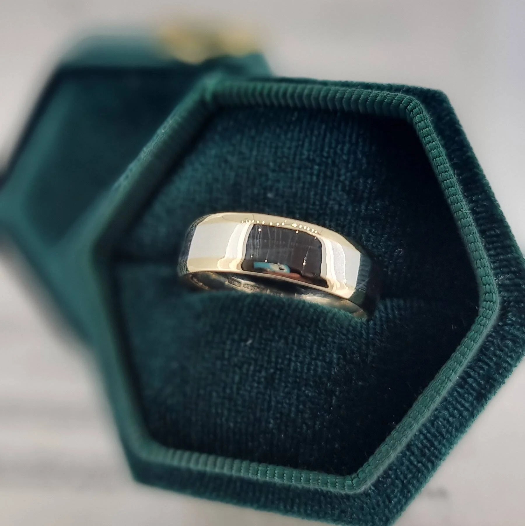 Two tone gold wedding bad made from recycled gold at Golden Snowdrop the jewellers in Shaftesbury, near Stockbridge. 