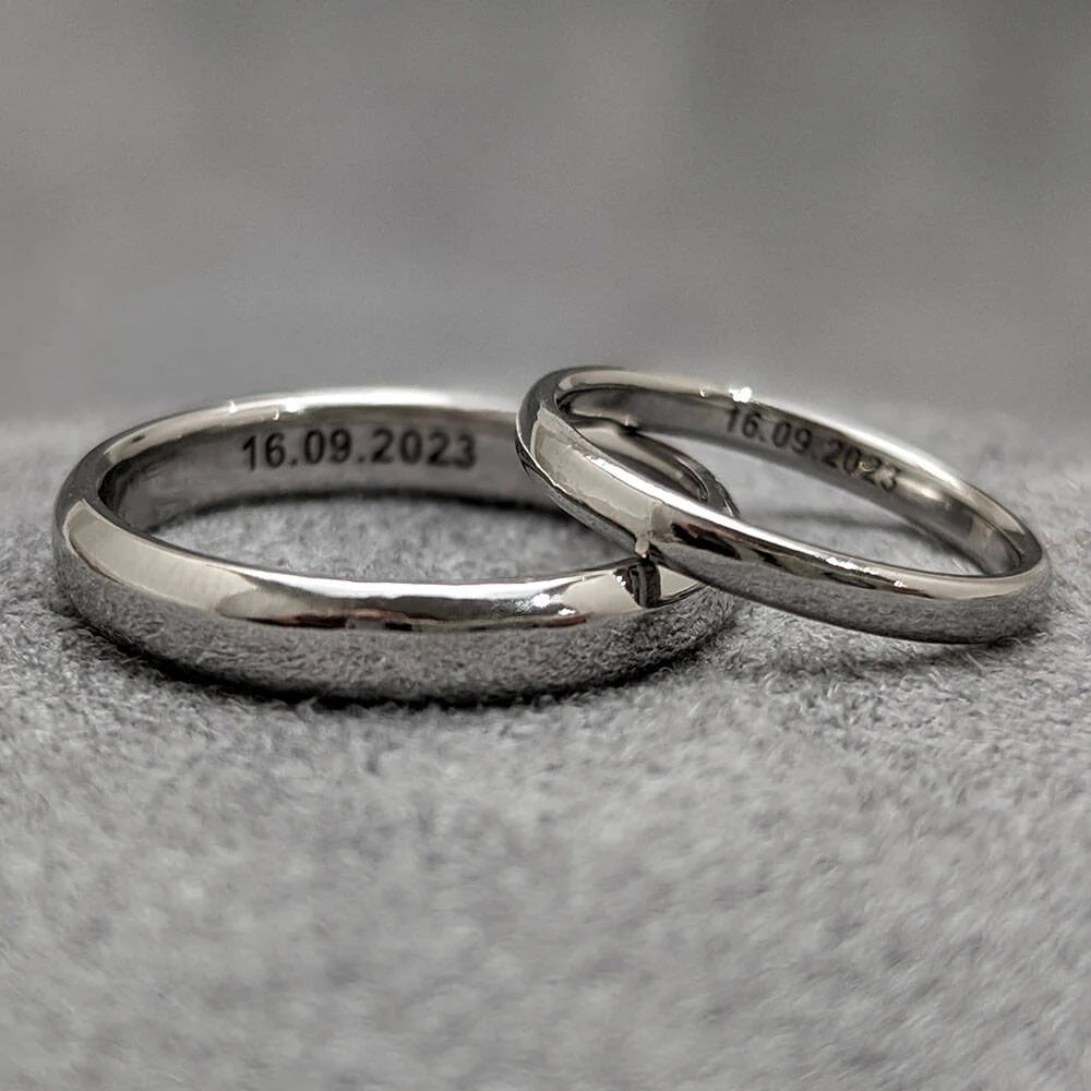 Court Profile Wedding Rings. Handmade in platinum and laser engraved at Golden Snowdrop the jewellers in Shaftesbury, near Bruton. 