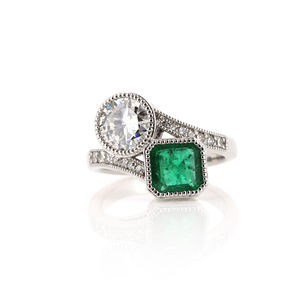 Bespoke Emerald and Diamond ‘Toi Et Moi’ Platinum Ring. Bespoke piece featuring our Zambian Emerald and our customers remodelled Diamonds at Golden Snowdrop, the jewellers in Shaftesbury near Tisbury. 