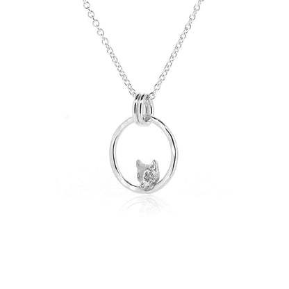Handmade Sterling Silver Mr Fox necklace shown on textured circle pendant, crafted by Golden Snowdrop Jewellers