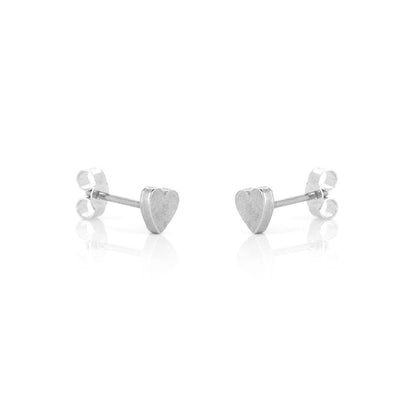 Sterling silver heart stud earrings showing textured hammered finish | Golden Snowdrop
