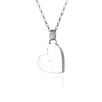 Close view of large sterling silver heart necklace | Golden Snowdrop