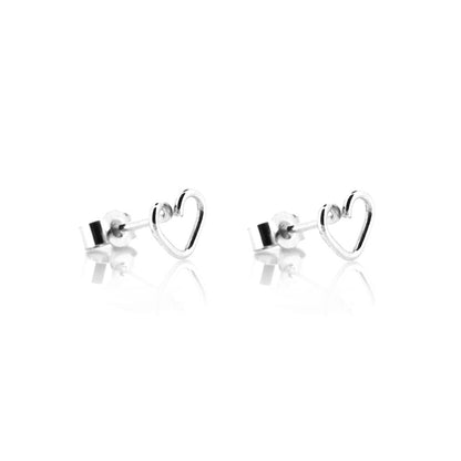 Sterling silver heart outline stud earrings shown close up | Golden Snowdrop