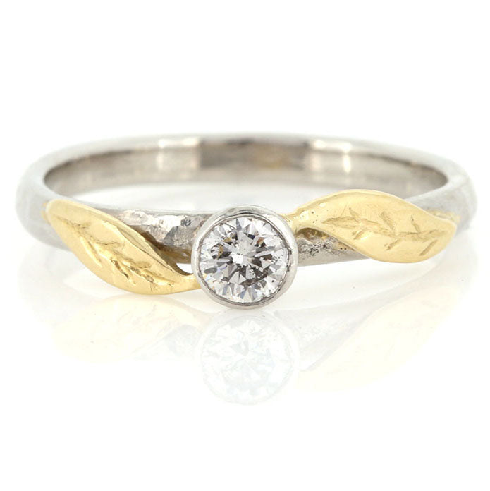 Bespoke Diamond, Platinum and 18ct Gold Engagement Ring. Handmade with 18ct gold leaf detail at Golden Snowdrop the jewellers in Shaftesbury Dorset near Tisbury. 
