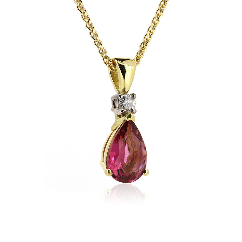 Bespoke Pink Tourmaline and Diamond Pendant in 18ct Yellow Gold. Handmade using our stones at Golden Snowdrop, the jewellers in Shaftesbury, near Wimborne. 