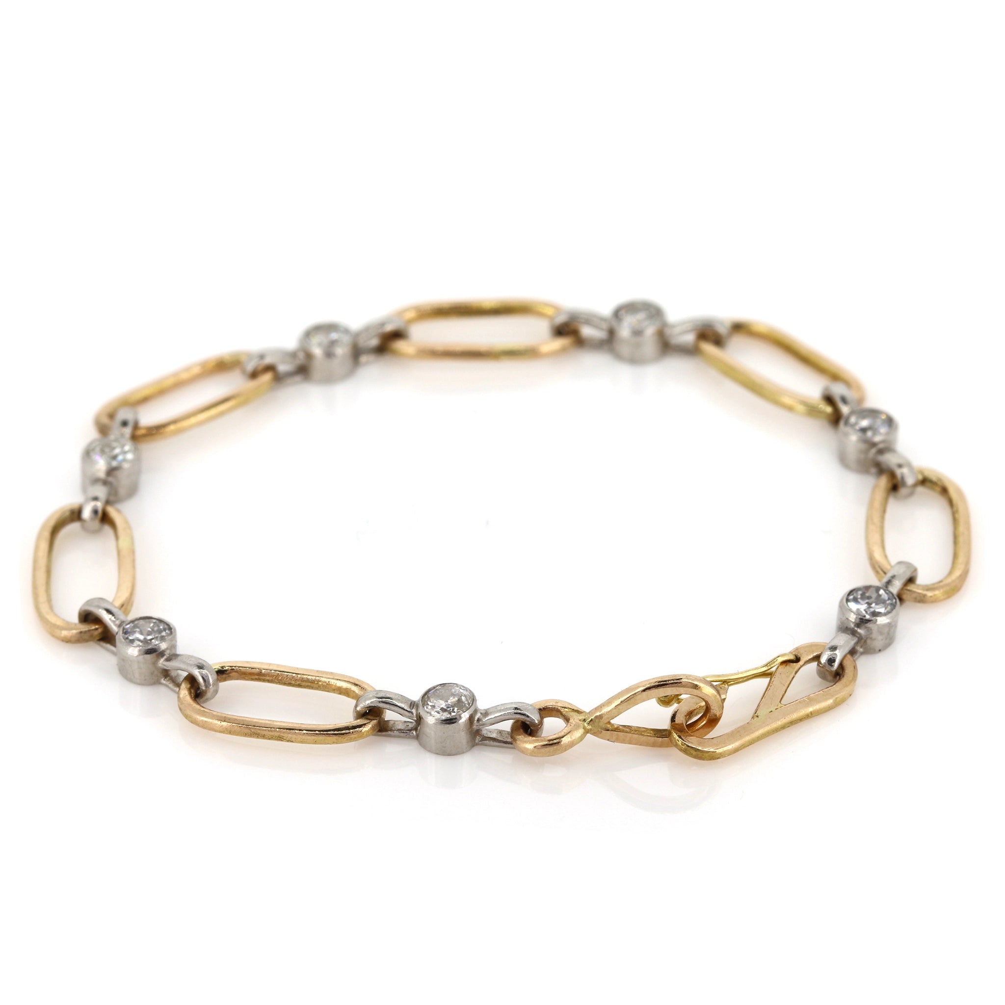 Diamond, Platinum and 18ct Gold Oval Link Bracelet. Designed and handmade using our customers materials at Golden Snowdrop the jewellers in Shaftesbury, near Salisbury. 