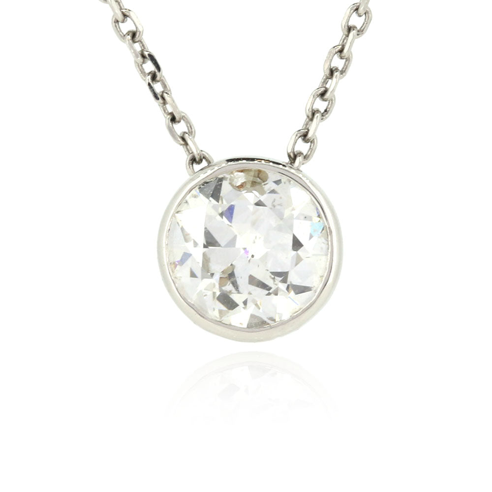 Round diamond solitaire pendant in platinum. Remodelled jewellery. Golden Snowdrop Shaftesbury Dorset
