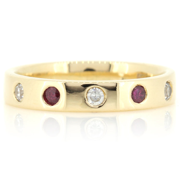 Bespoke Flush-Set Diamond, Ruby and Cubic Zirconia in a 9ct, Yellow Gold Band. Bespoke design made using our customers materials at Golden Snowdrop Jewellers in Shaftesbury Dorset, near Ashmore. 