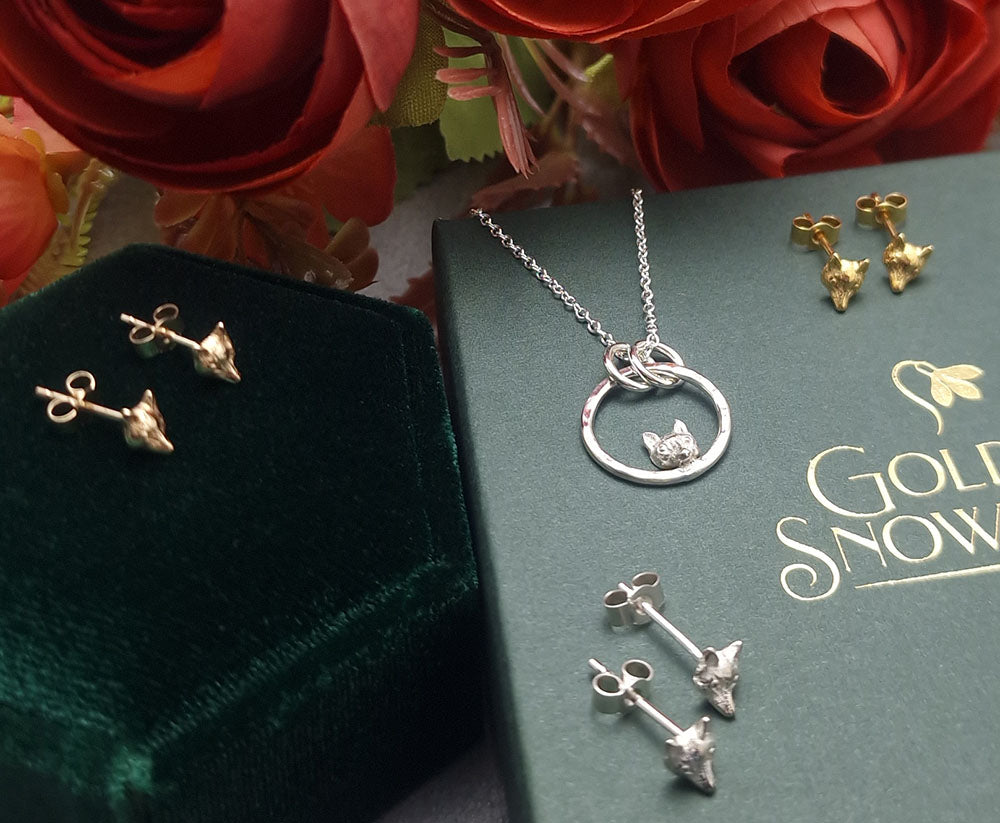 Fine jewellery close-up of Mr Fox motif crafted in precious metal by Golden Snowdrop