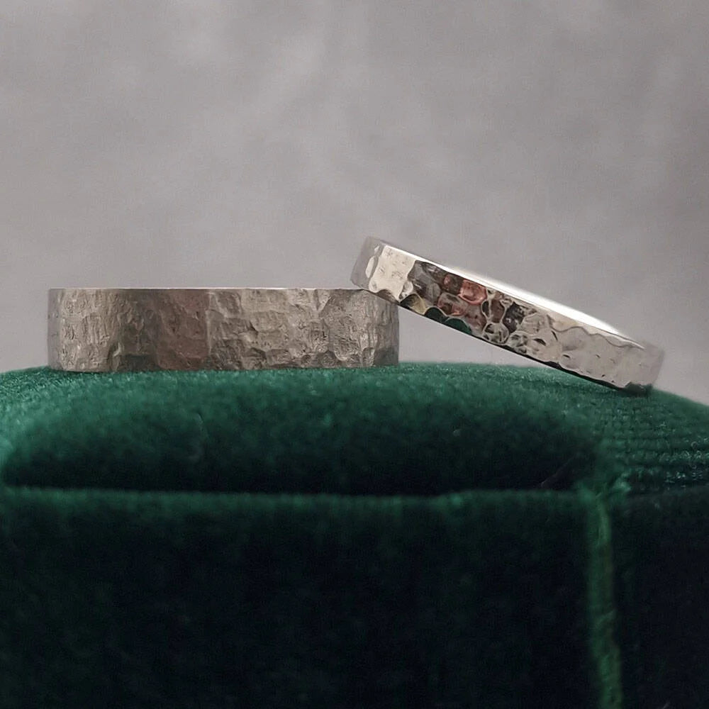 Platinum Hammered Wedding Bands.
One with a brushed finish, the other with a polished finish. Made at Golden Snowdrop the jewellers in Shaftesbury, near Warminster. 