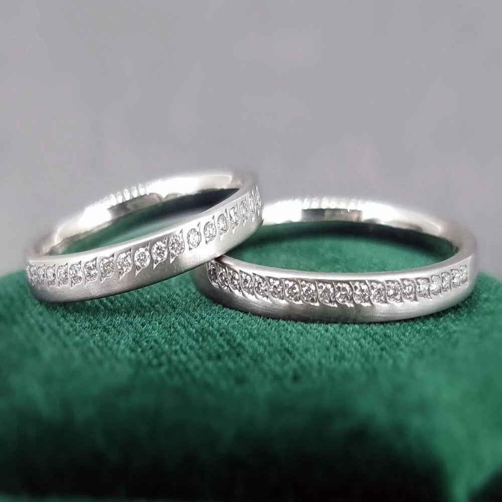platinum and natural diamond unusual wedding rings by Golden Snowdrop the jewellers in Shaftesbury Dorset