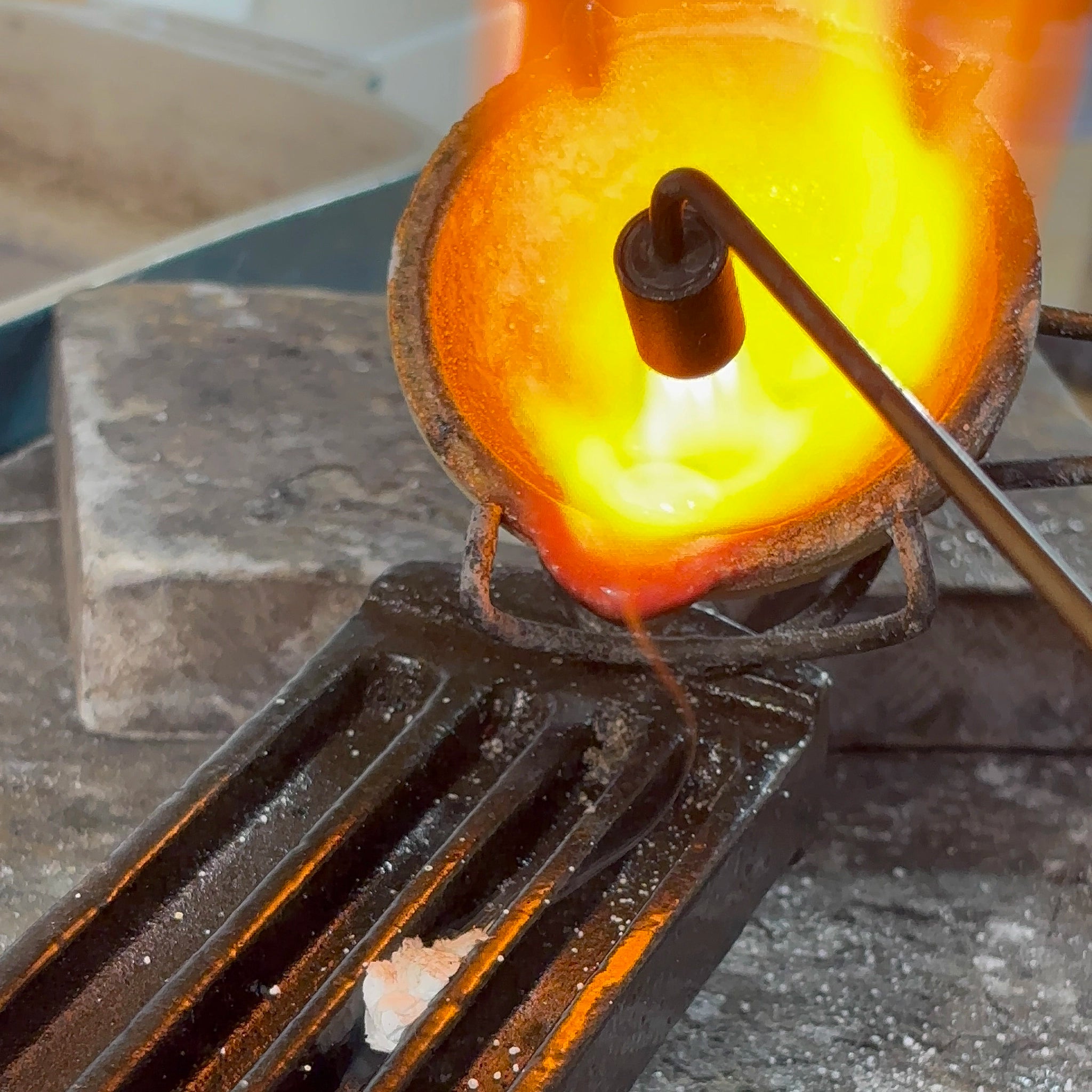 Yellow gold being melted down and poured into and ingot | Golden Snowdrop