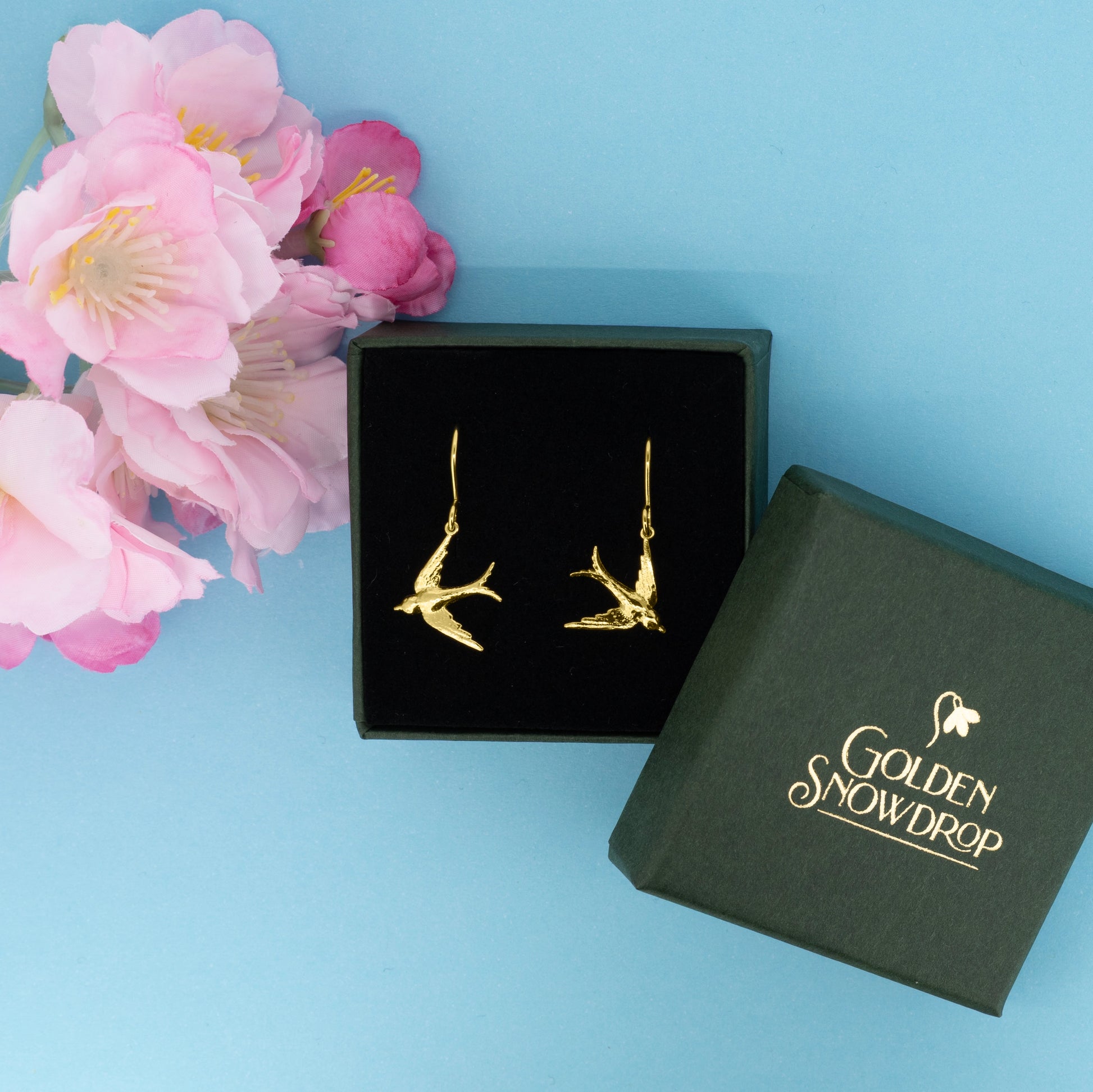 Small swallow drop earrings in yellow gold vermeil displayed in jewellery box | Golden Snowdrop