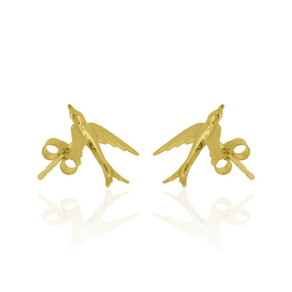 Gold bird-shaped earrings on a white background