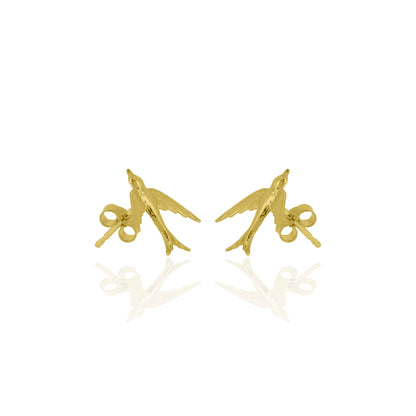 Gold bird-shaped earrings on a white background