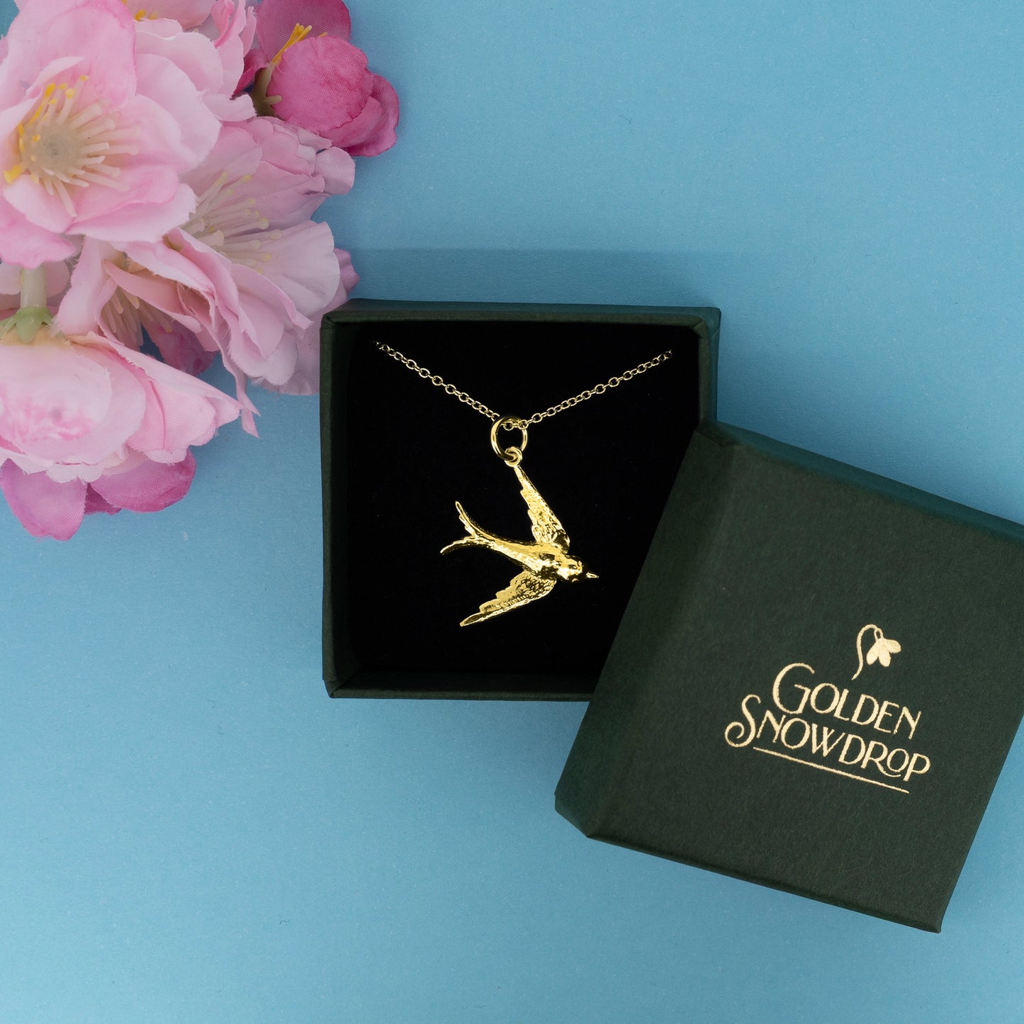 Large swallow pendant necklace in yellow gold vermeil displayed in jewellery box | Golden Snowdrop