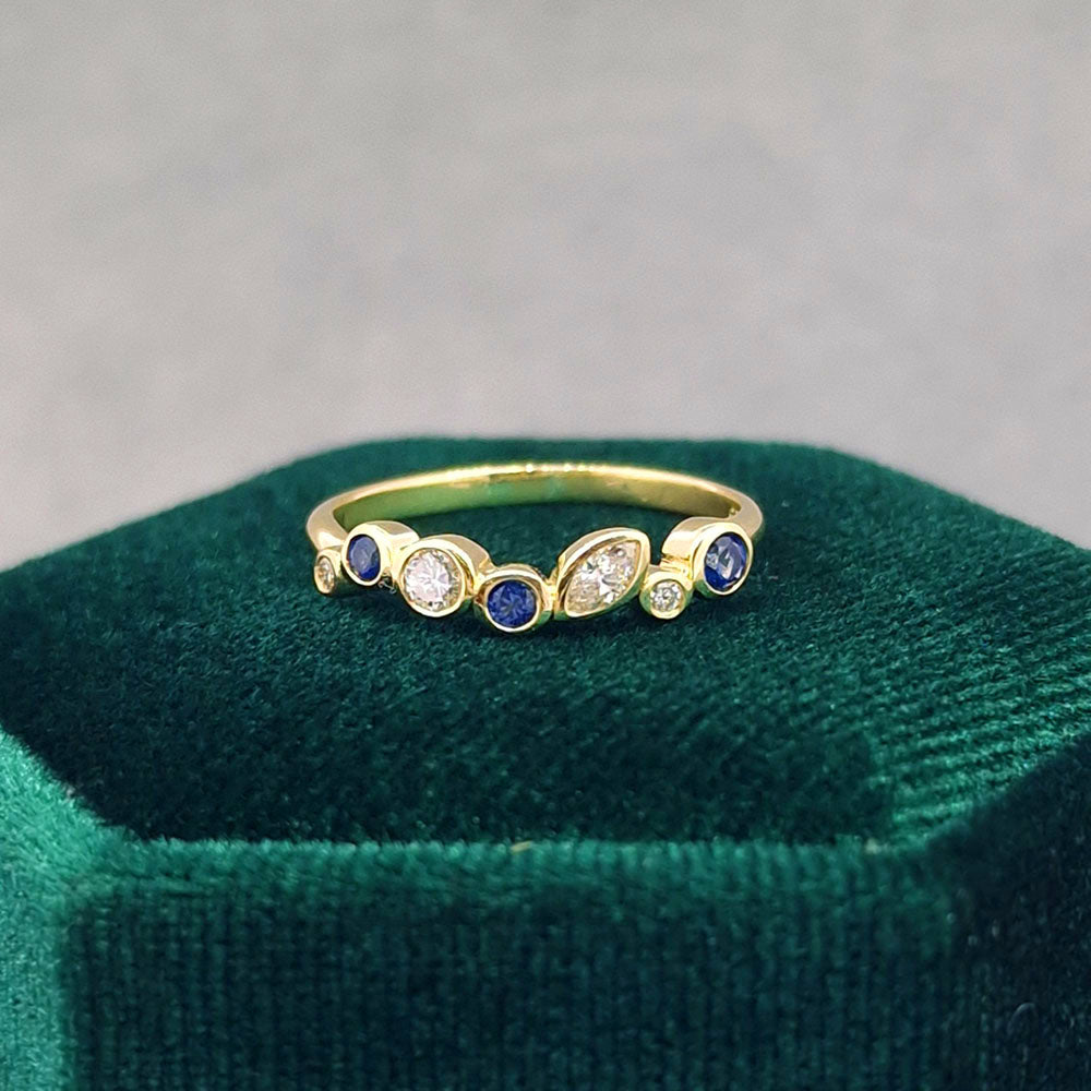 Bespoke Sapphire and Diamond 18ct Yellow Gold Ring. Hand finished using one of our customers remodelled Diamonds, at Golden Snowdrop the jewellers in Shaftesbury near Broad Chalke.