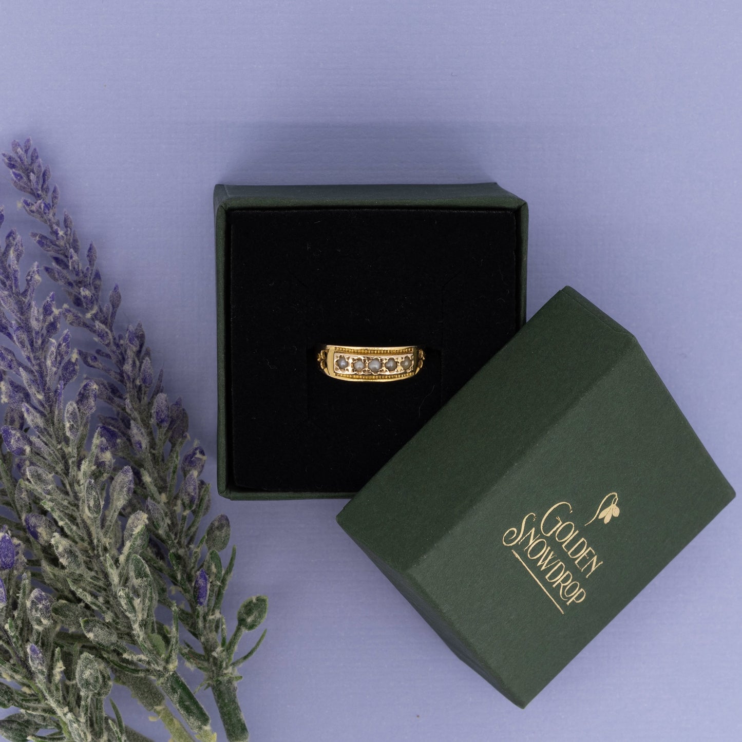 15ct yellow gold pearl ring displayed in green jewellery box | Golden Snowdrop