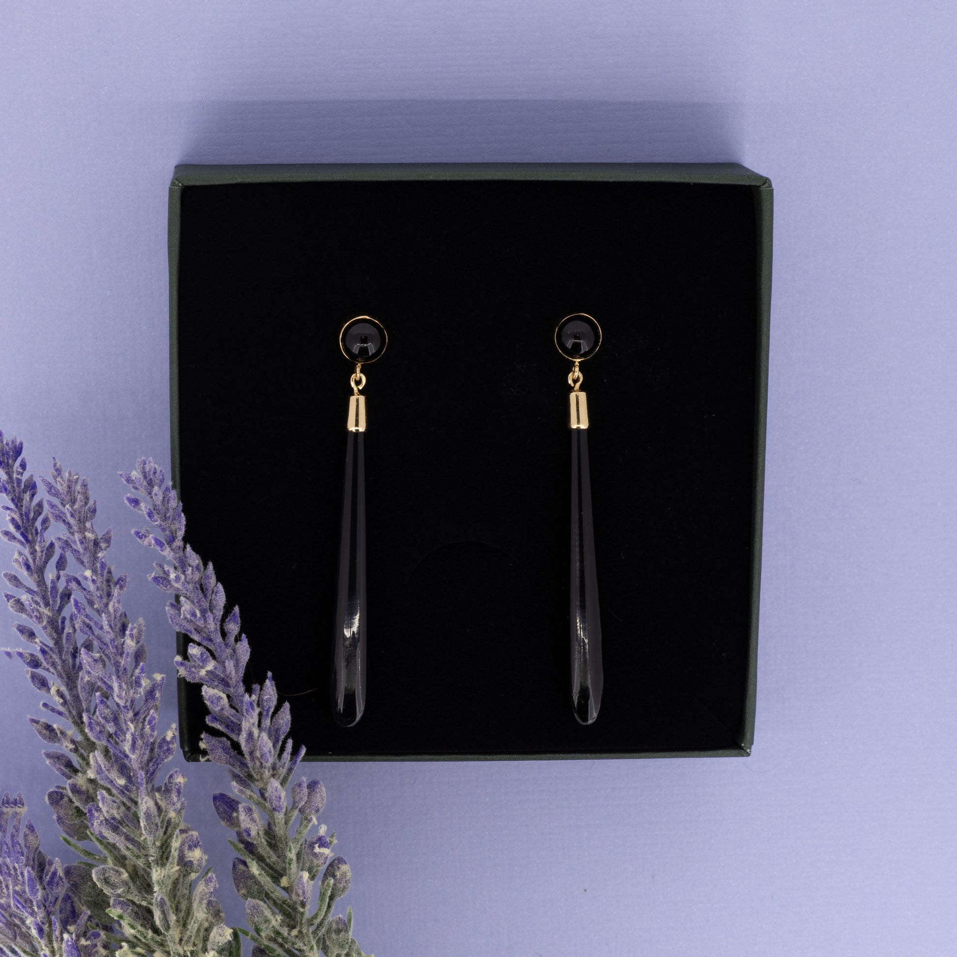 Black onyx torpedo drop earrings in 9ct yellow gold displayed in jewellery box | Golden Snowdrop
