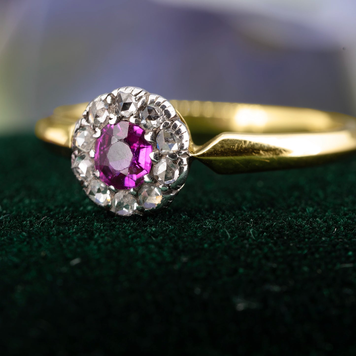 Victorian ruby cluster ring on green box with diamond halo detail | Golden Snowdrop